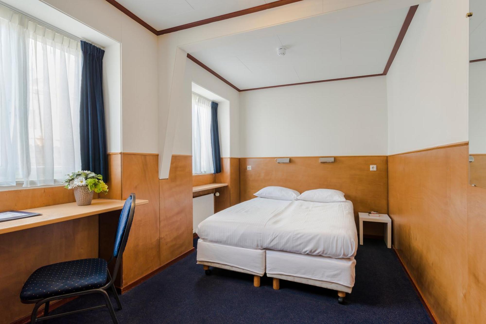 Quarto Duplo com Casa de Banho Privativa